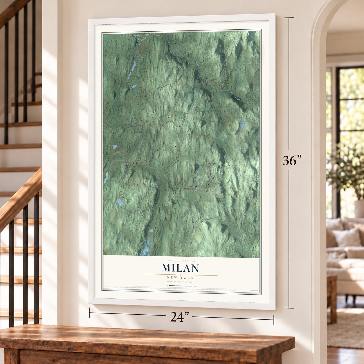 Milan, New York map, 24 x 36 inch print in a white frame by a staircase