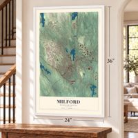 Milford, Massachusetts map, 24 x 36 inch print in a white frame by a staircase