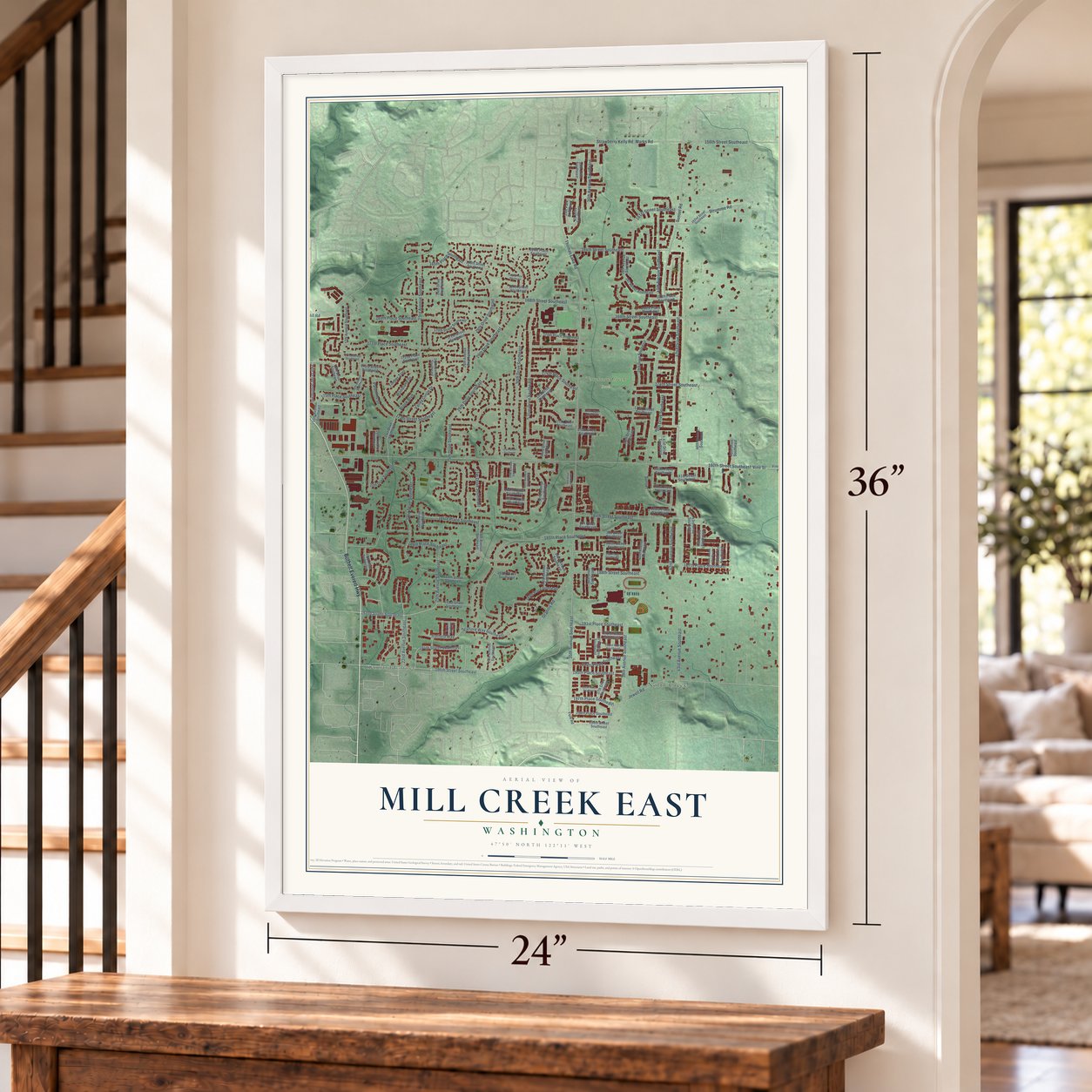 Mill Creek East, Washington map, 24 x 36 inch print in a white frame by a staircase