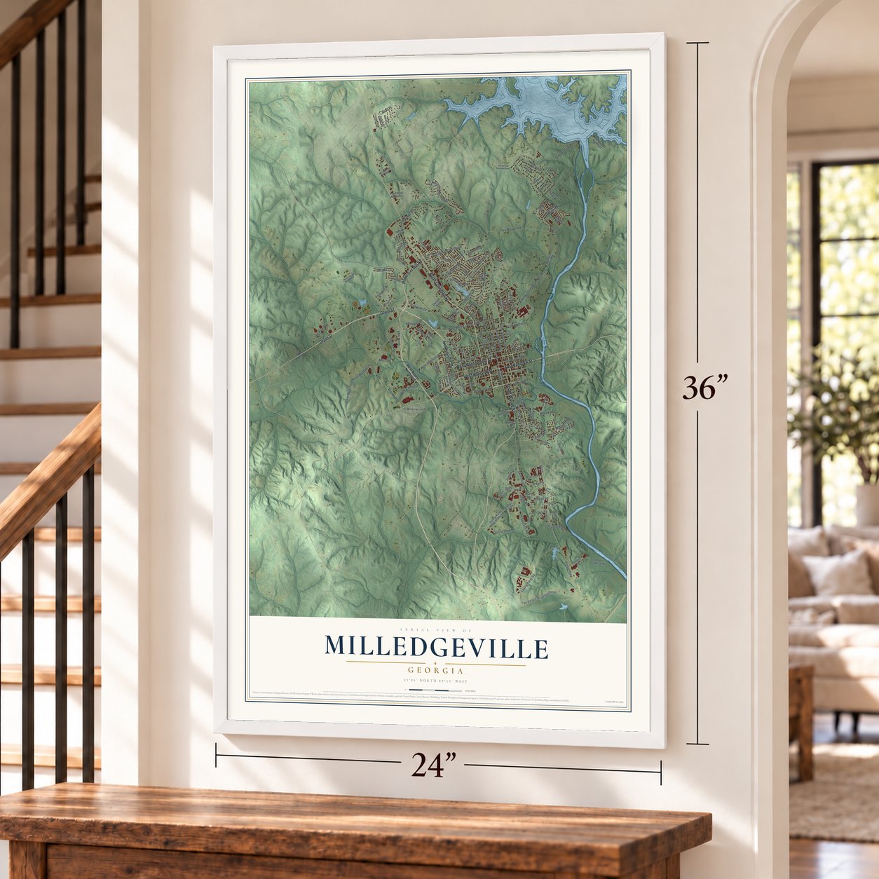 Milledgeville, Georgia map, 24 x 36 inch print in a white frame by a staircase