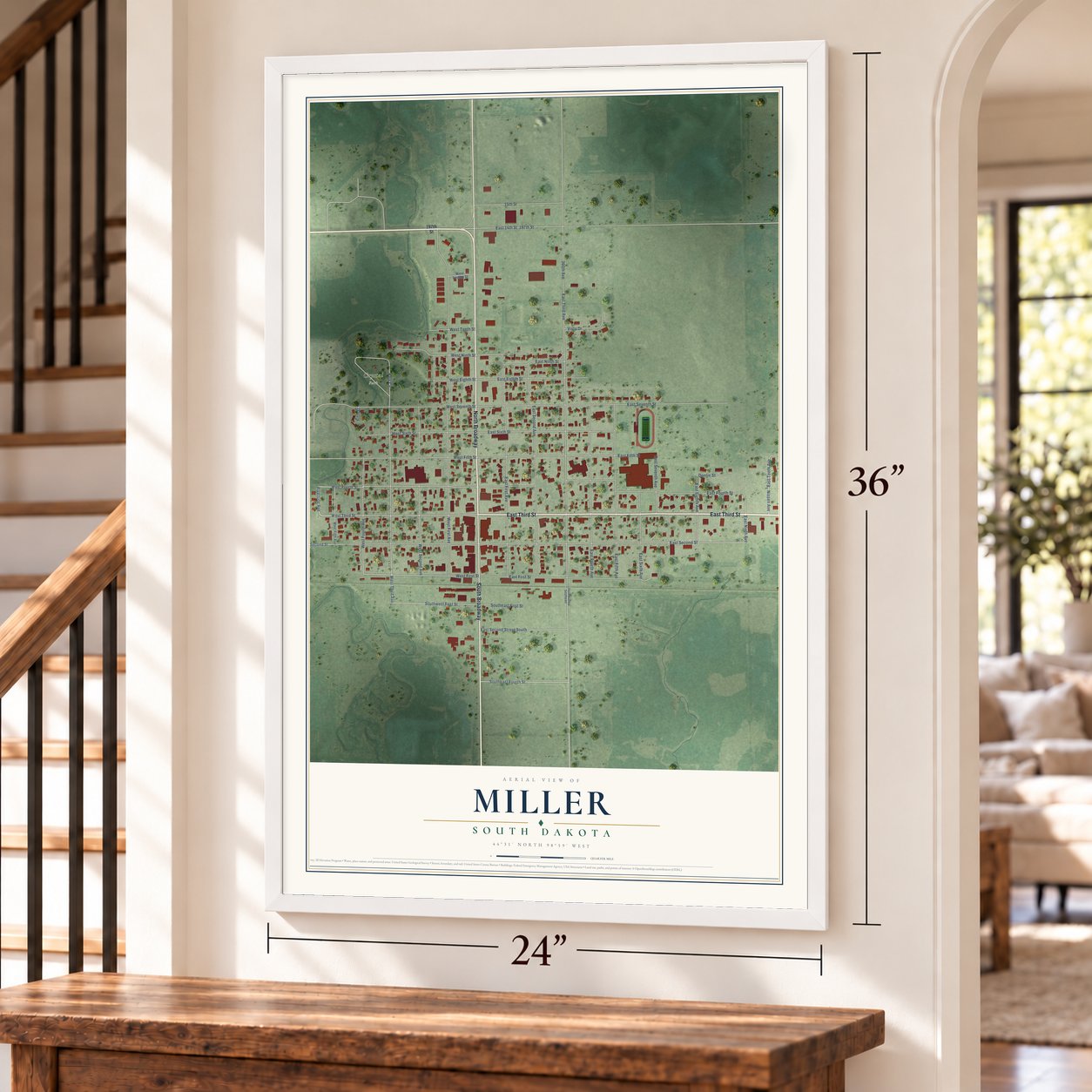 Miller, South Dakota map, 24 x 36 inch print in a white frame by a staircase