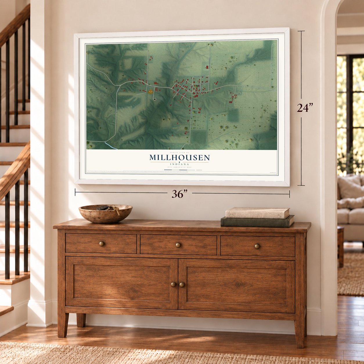 Millhousen, Indiana map, 24 x 36 inch print in a white frame above a dresser by a staircase