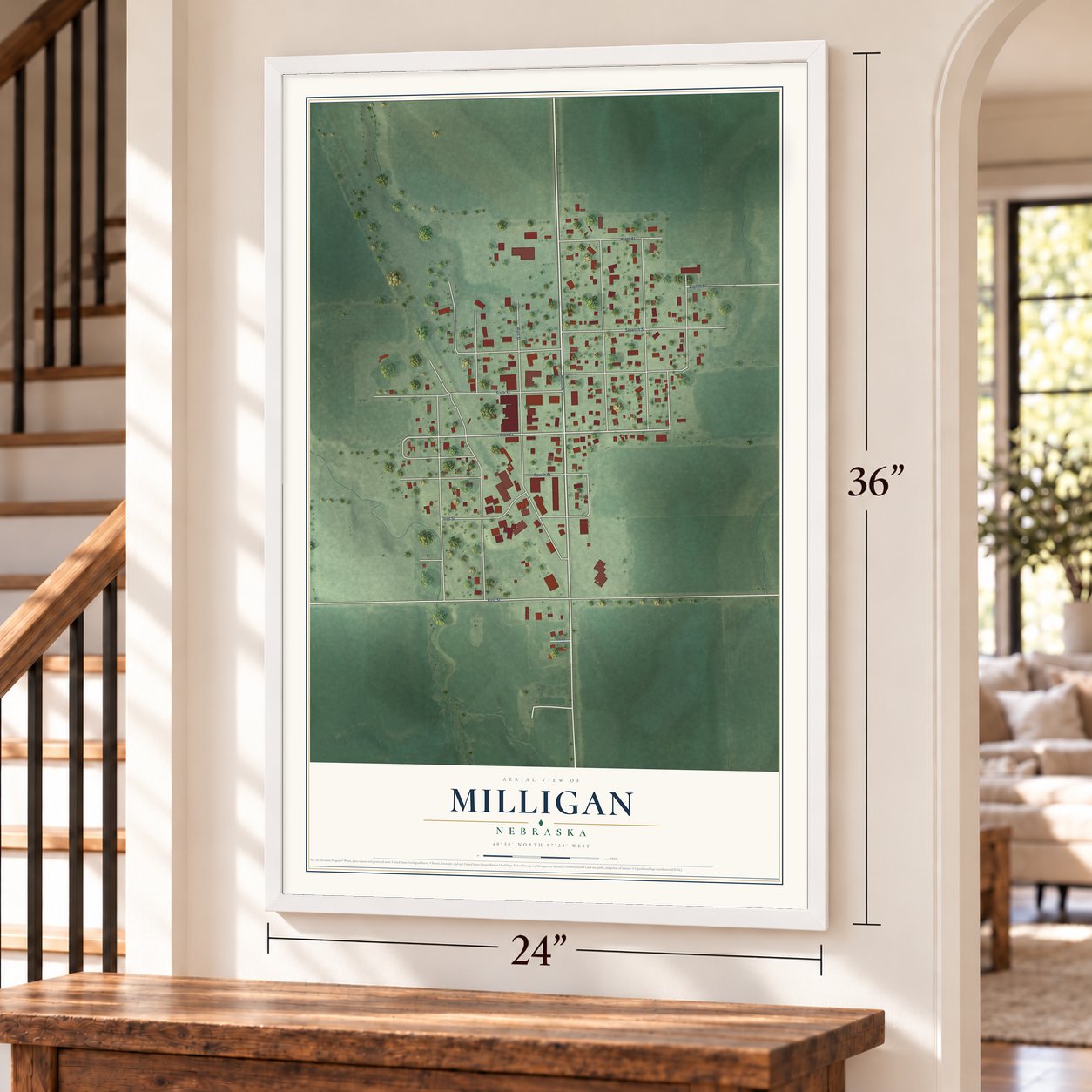 Milligan, Nebraska map, 24 x 36 inch print in a white frame by a staircase