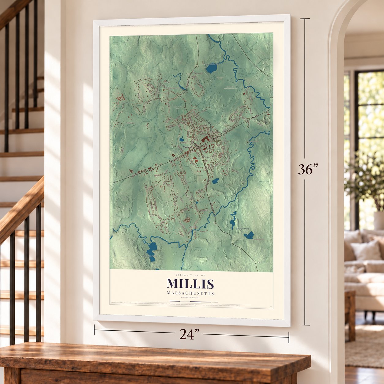 Millis, Massachusetts map, 24 x 36 inch print in a white frame by a staircase
