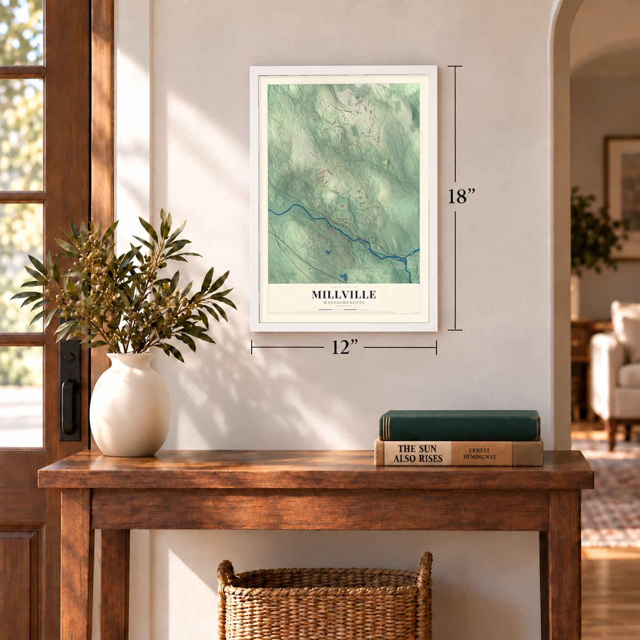 Millville, Massachusetts map, 12 x 18 inch print in a white frame in an entryway