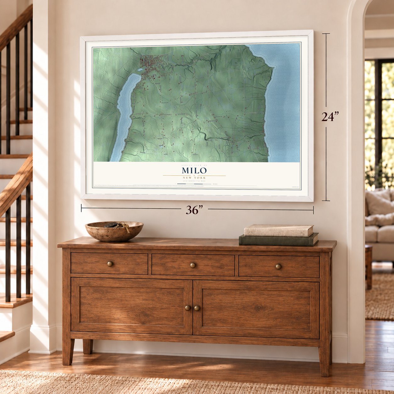 Milo, New York map, 24 x 36 inch print in a white frame above a dresser by a staircase