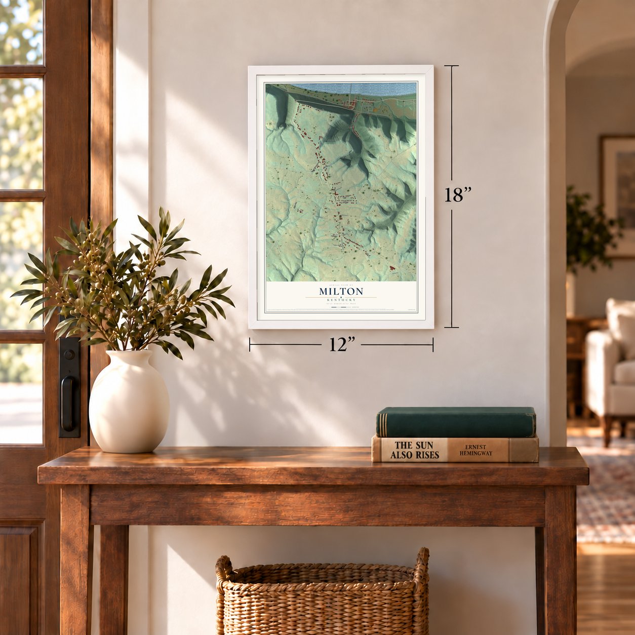 Milton, Kentucky map, 12 x 18 inch print in a white frame in an entryway