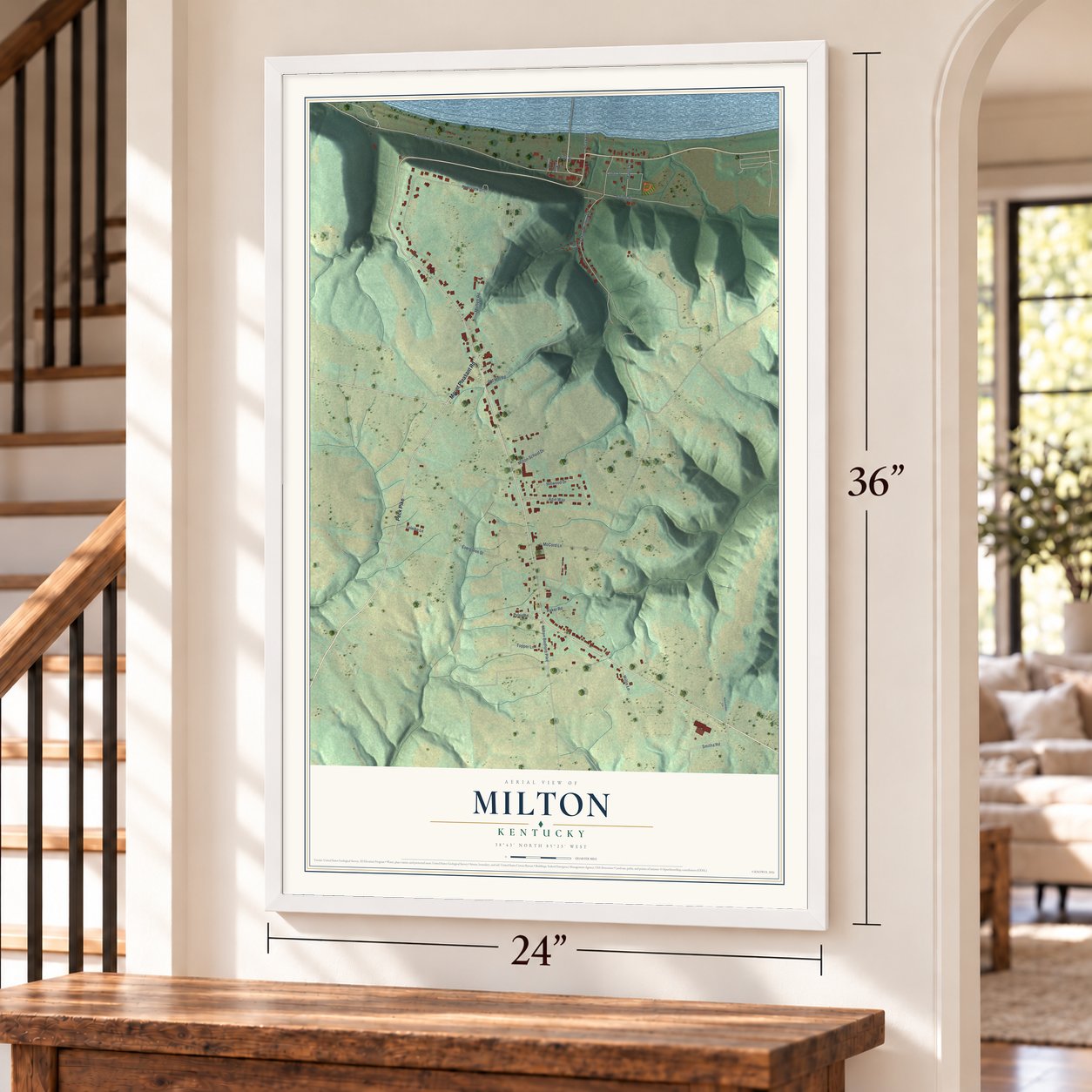 Milton, Kentucky map, 24 x 36 inch print in a white frame by a staircase