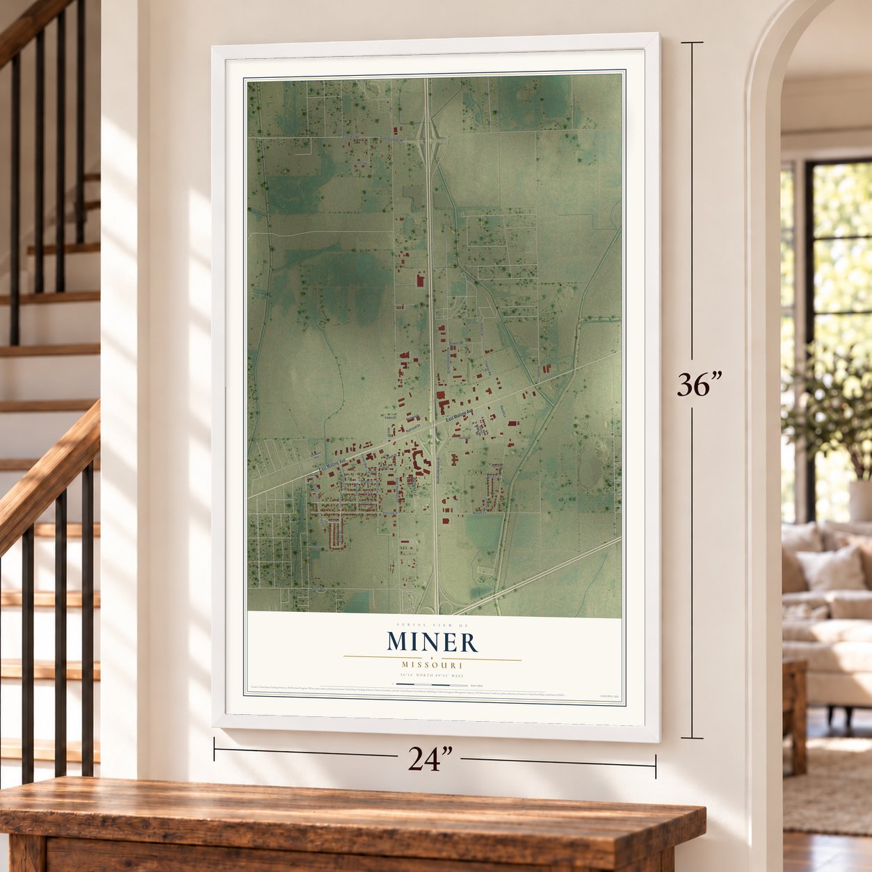 Miner, Missouri map, 24 x 36 inch print in a white frame by a staircase