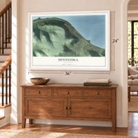 Minneiska, Minnesota map, 24 x 36 inch print in a white frame above a dresser by a staircase