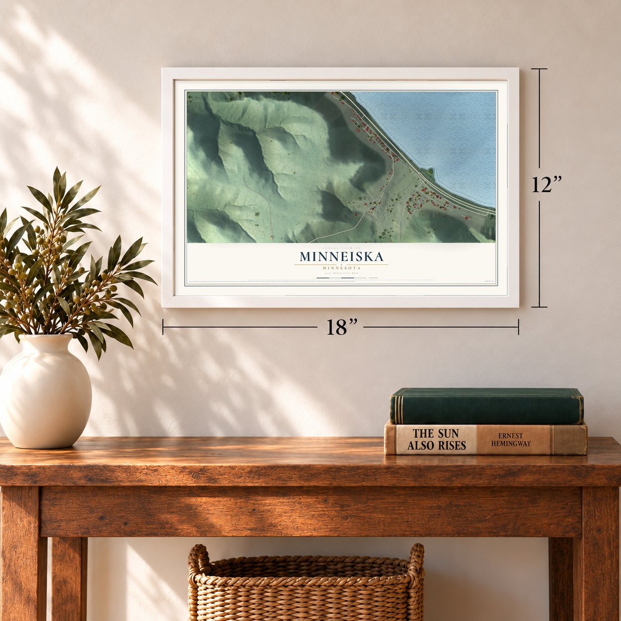 Minneiska, Minnesota map, 12 x 18 inch print in a white frame in an entryway