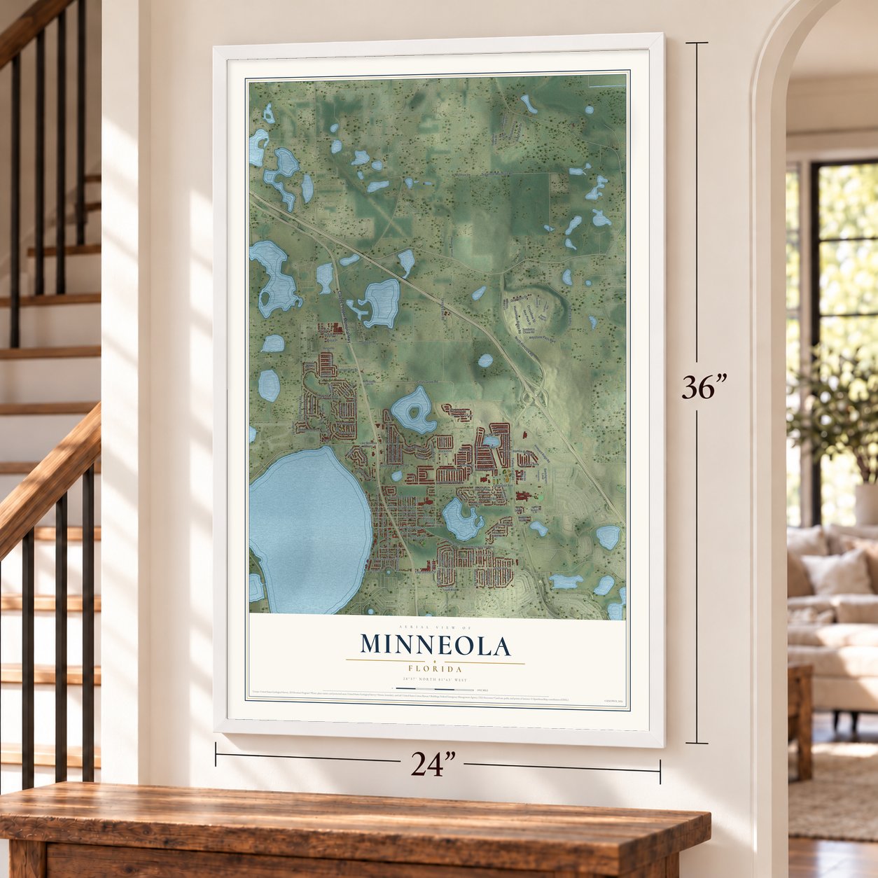 Minneola, Florida map, 24 x 36 inch print in a white frame by a staircase