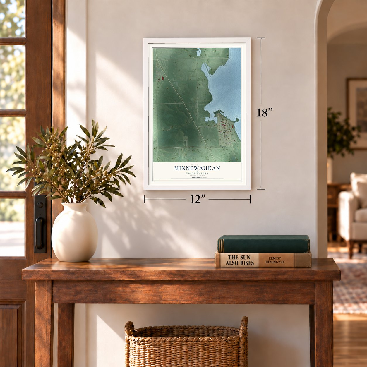 Minnewaukan, North Dakota map, 12 x 18 inch print in a white frame in an entryway