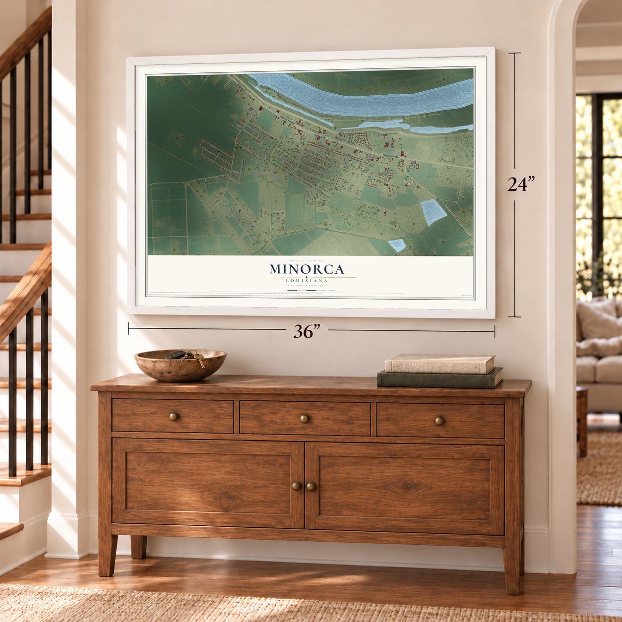 Minorca, Louisiana map, 24 x 36 inch print in a white frame above a dresser by a staircase