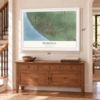 Mobridge, South Dakota map, 24 x 36 inch print in a white frame above a dresser by a staircase
