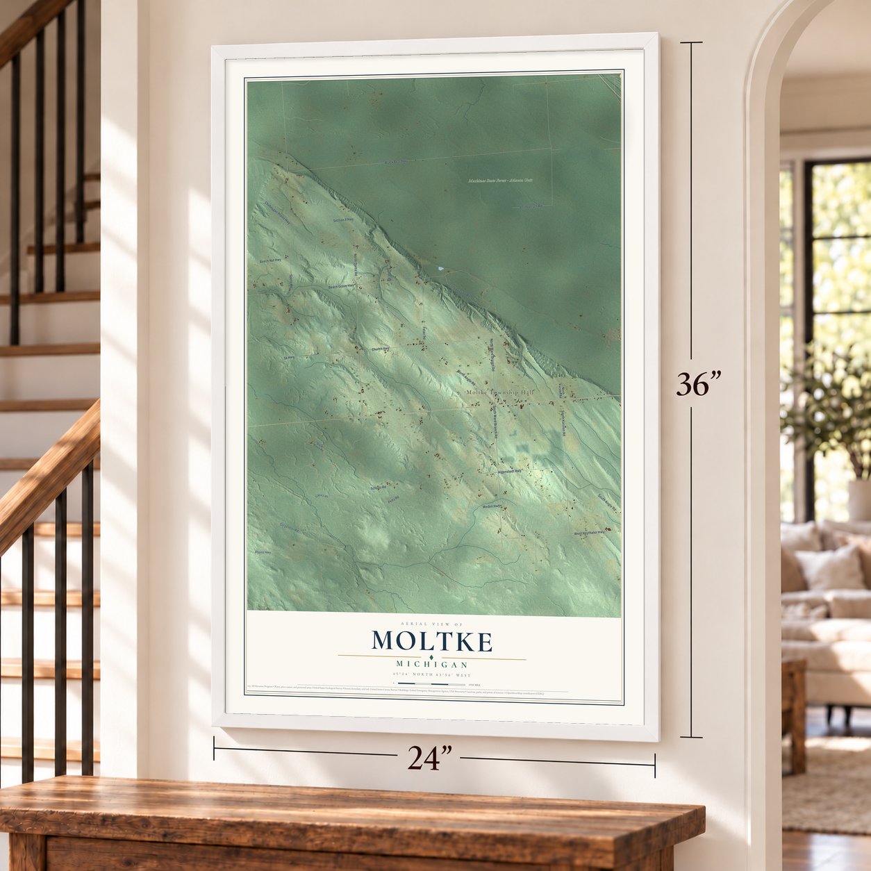 Moltke, Michigan map, 24 x 36 inch print in a white frame by a staircase