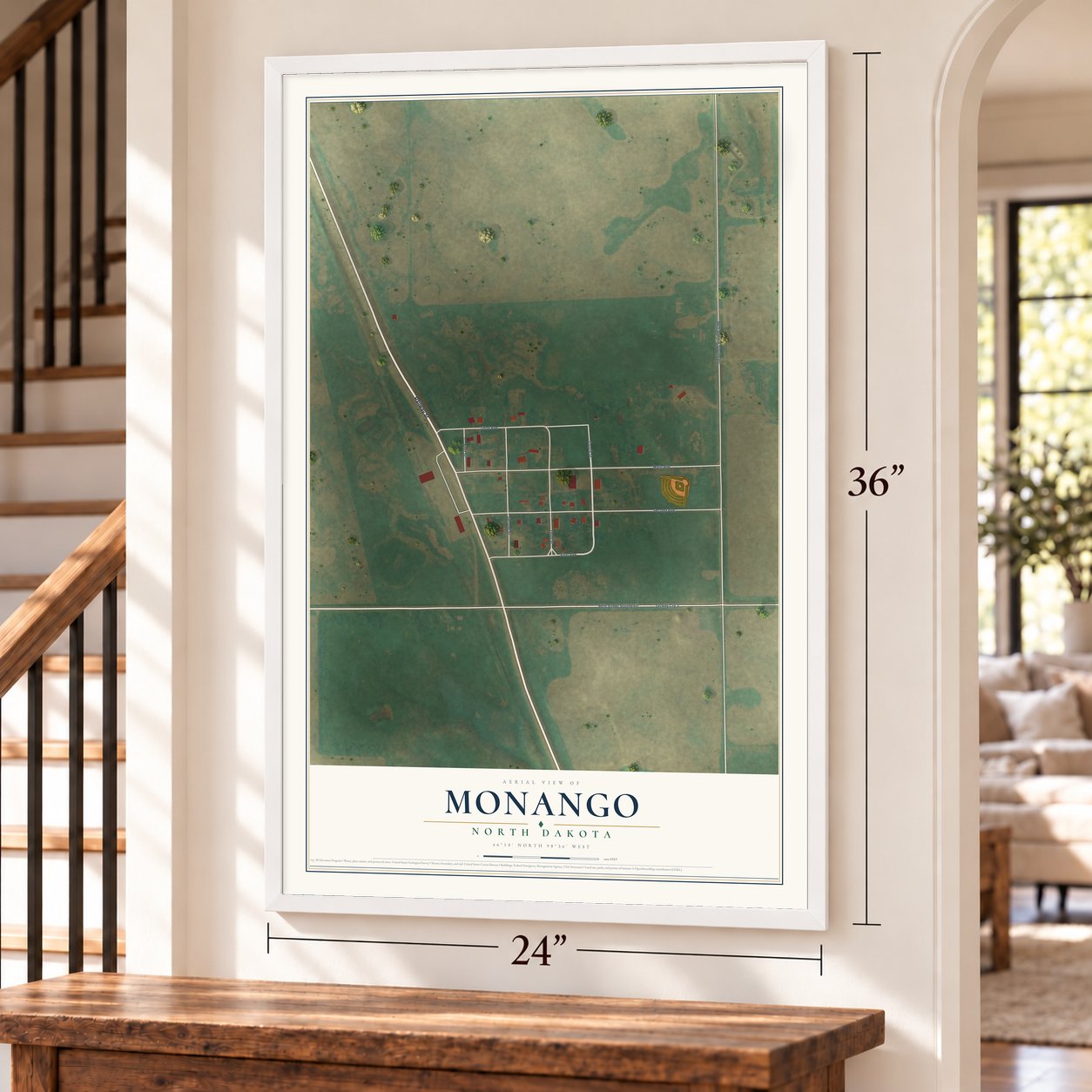 Monango, North Dakota map, 24 x 36 inch print in a white frame by a staircase