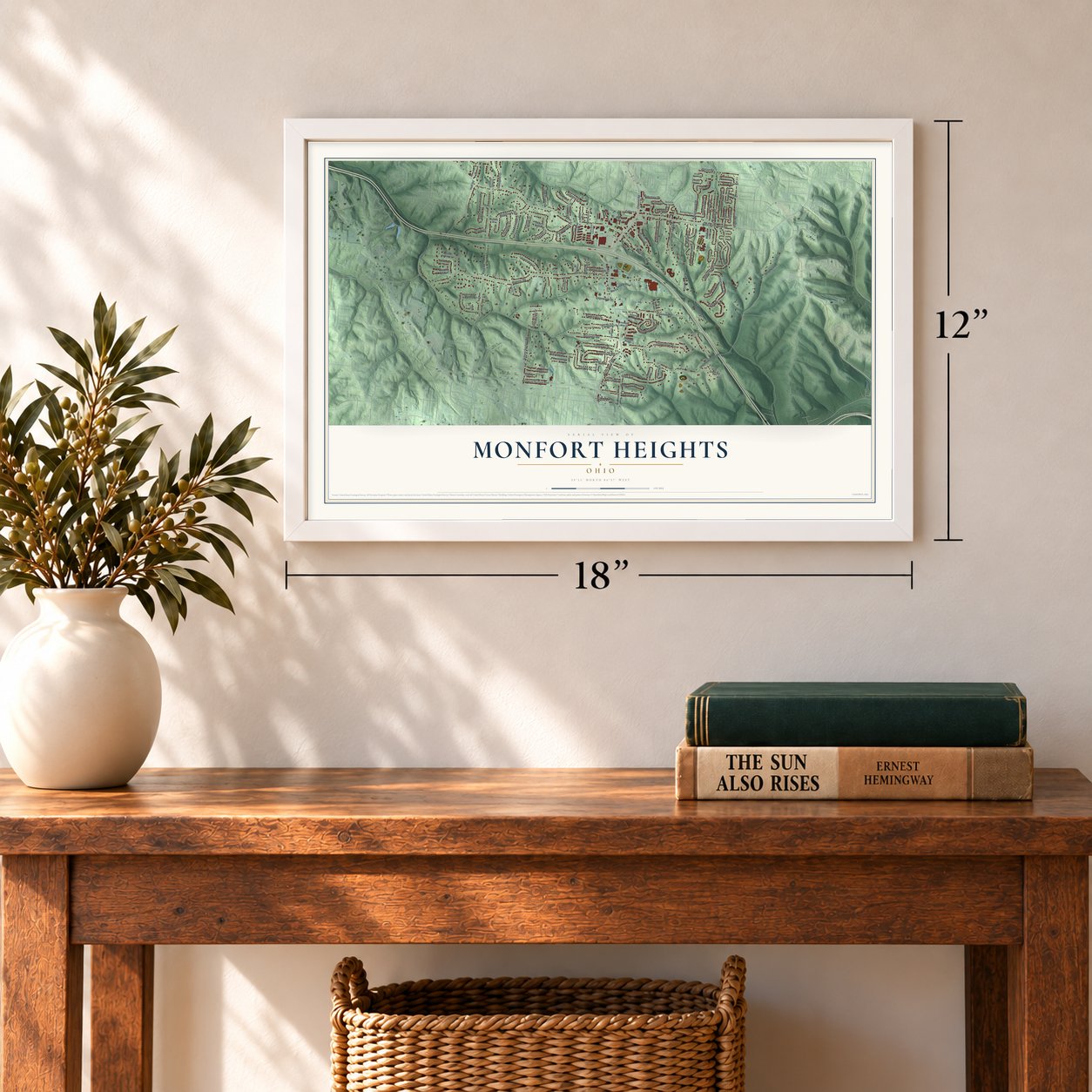 Monfort Heights, Ohio map, 12 x 18 inch print in a white frame in an entryway