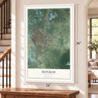 Monroe, Louisiana map, 24 x 36 inch print in a white frame by a staircase