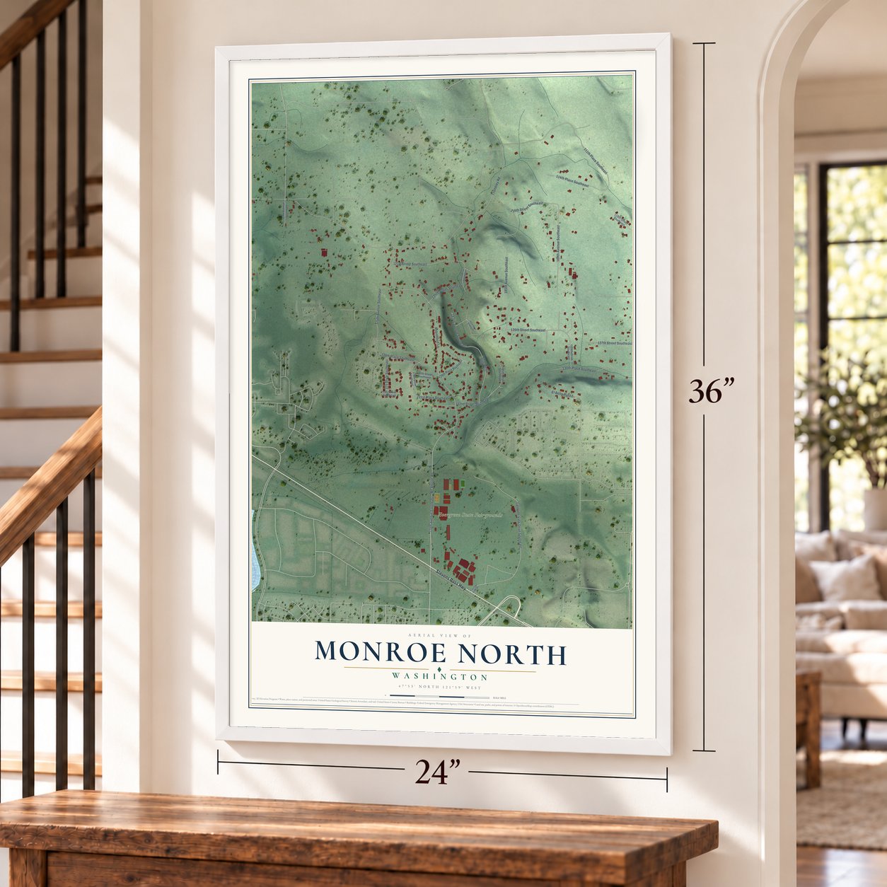 Monroe North, Washington map, 24 x 36 inch print in a white frame by a staircase