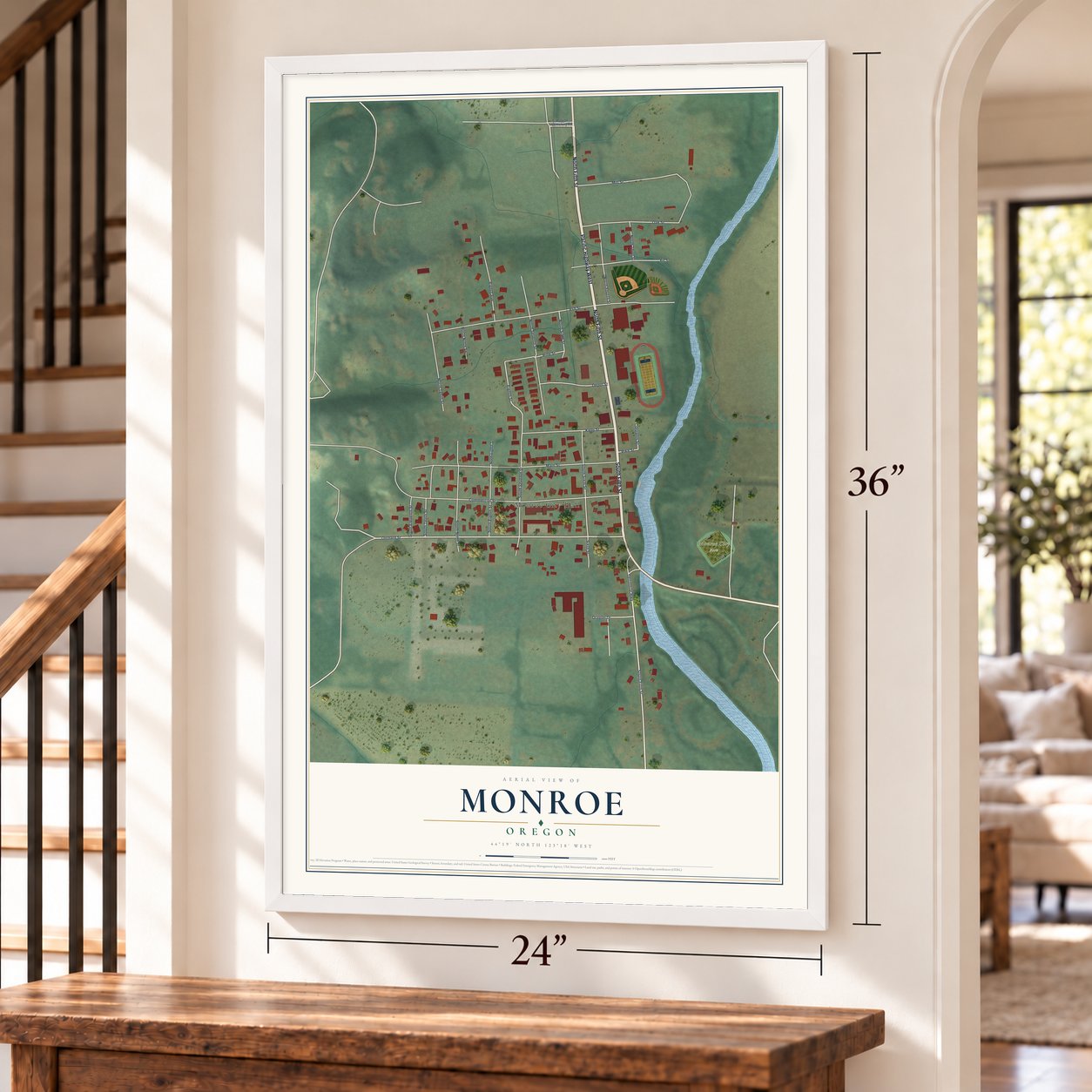 Monroe, Oregon map, 24 x 36 inch print in a white frame by a staircase