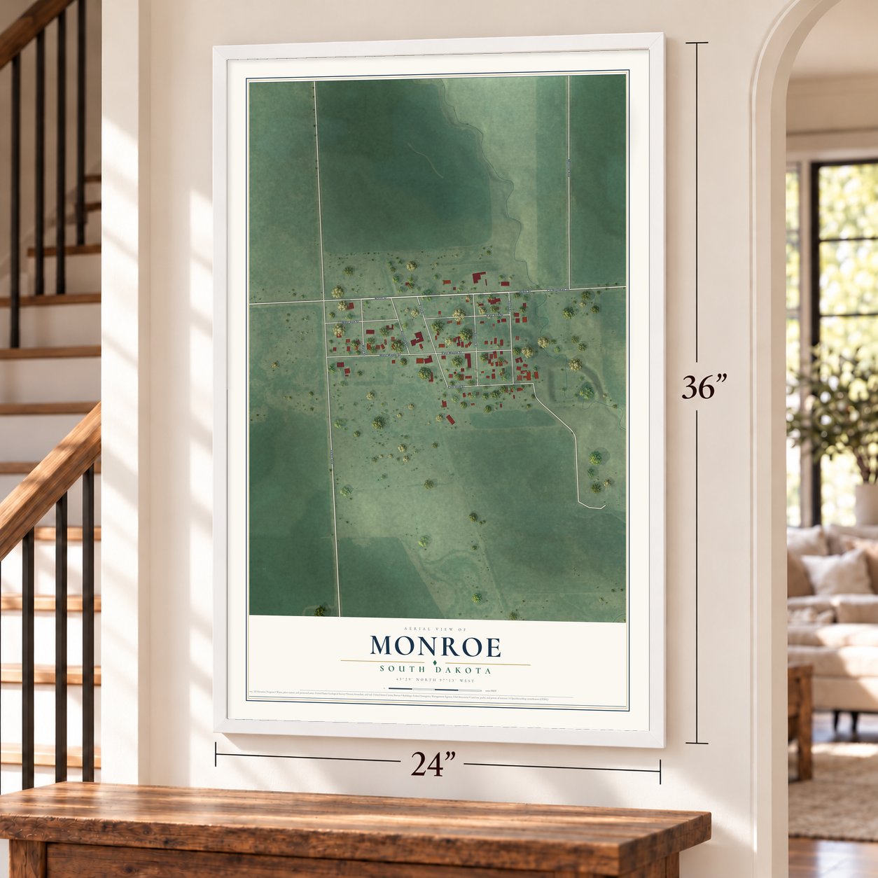 Monroe, South Dakota map, 24 x 36 inch print in a white frame by a staircase