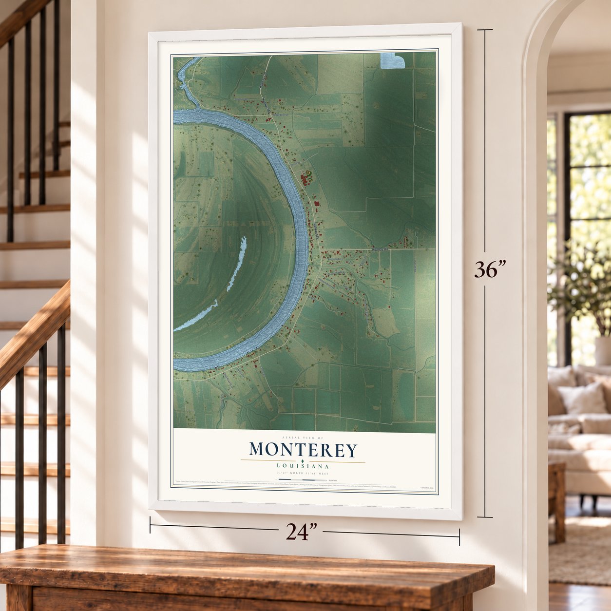 Monterey, Louisiana map, 24 x 36 inch print in a white frame by a staircase
