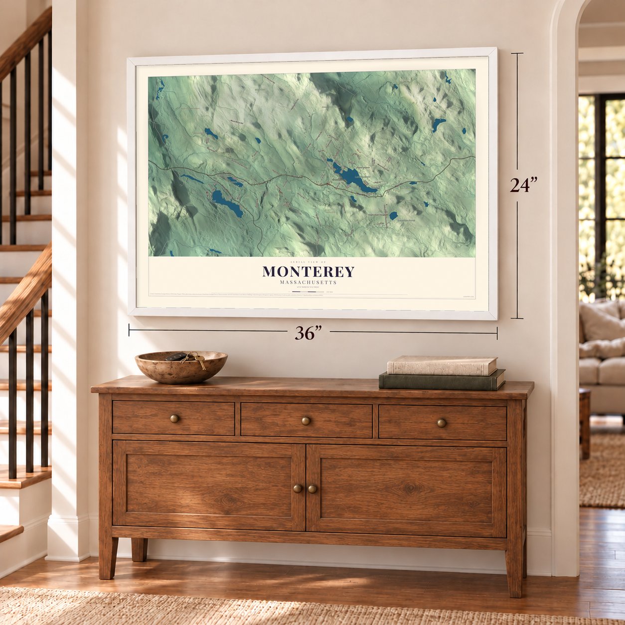 Monterey, Massachusetts map, 24 x 36 inch print in a white frame above a dresser by a staircase