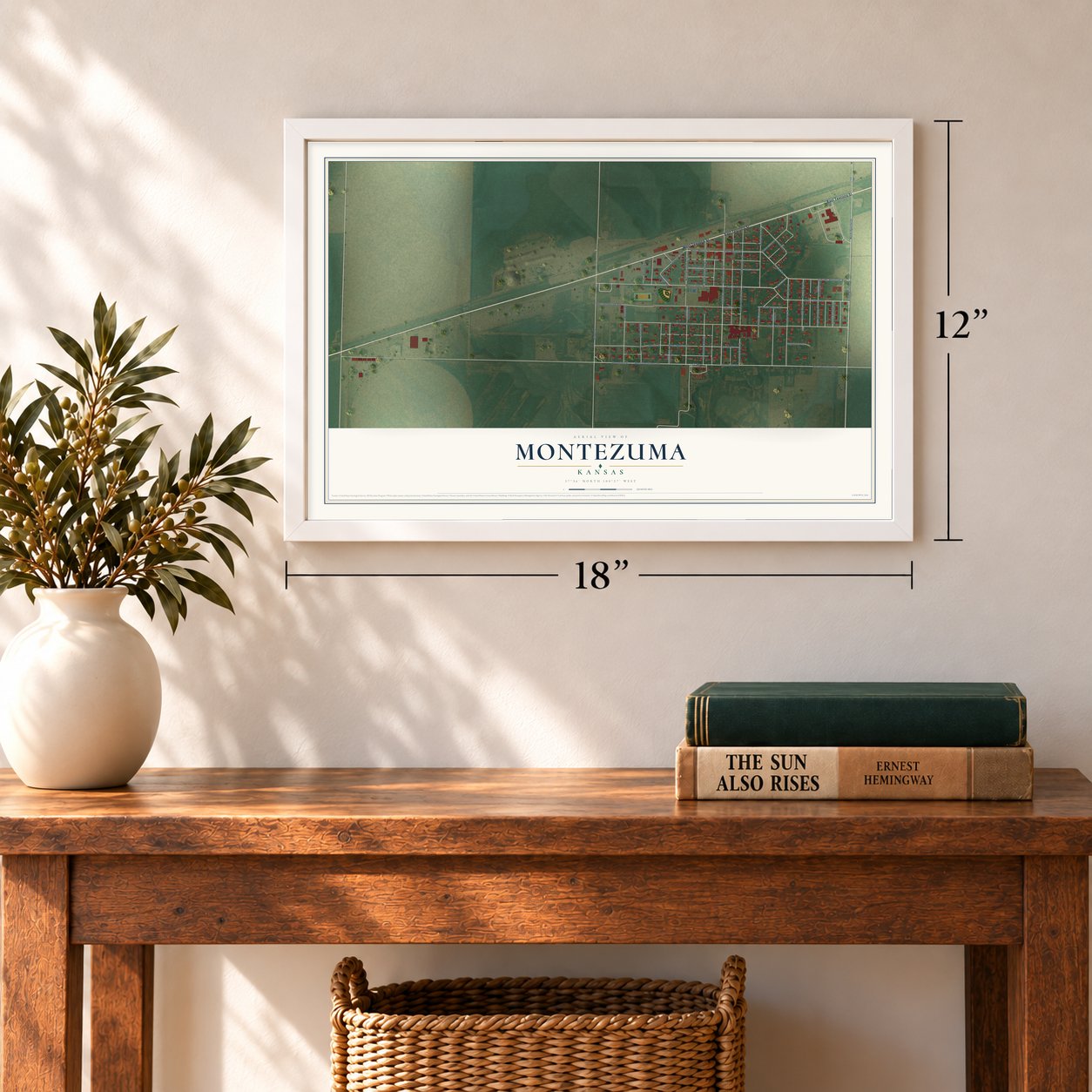 Montezuma, Kansas map, 12 x 18 inch print in a white frame in an entryway