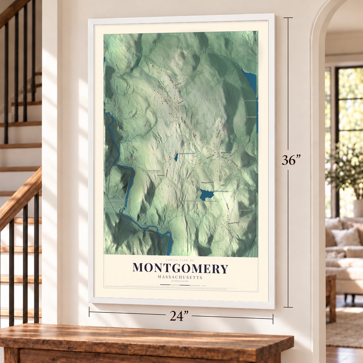 Montgomery, Massachusetts map, 24 x 36 inch print in a white frame by a staircase