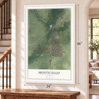 Monticello, Illinois map, 24 x 36 inch print in a white frame by a staircase