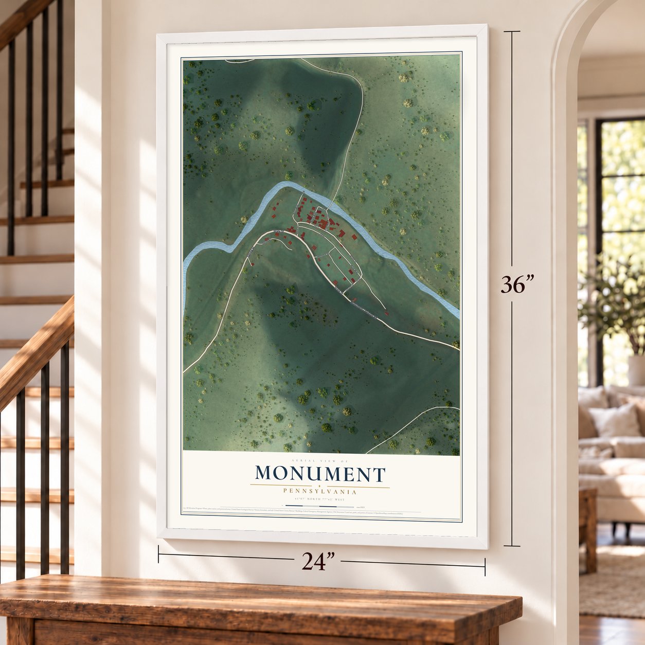 Monument, Pennsylvania map, 24 x 36 inch print in a white frame by a staircase