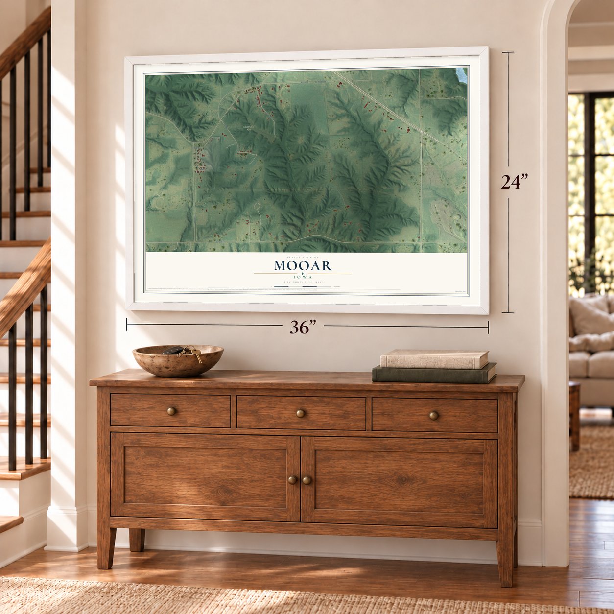 Mooar, Iowa map, 24 x 36 inch print in a white frame above a dresser by a staircase