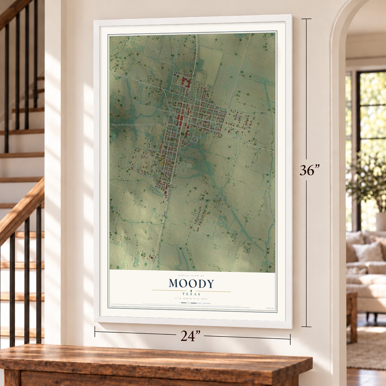 Moody, Texas map, 24 x 36 inch print in a white frame by a staircase