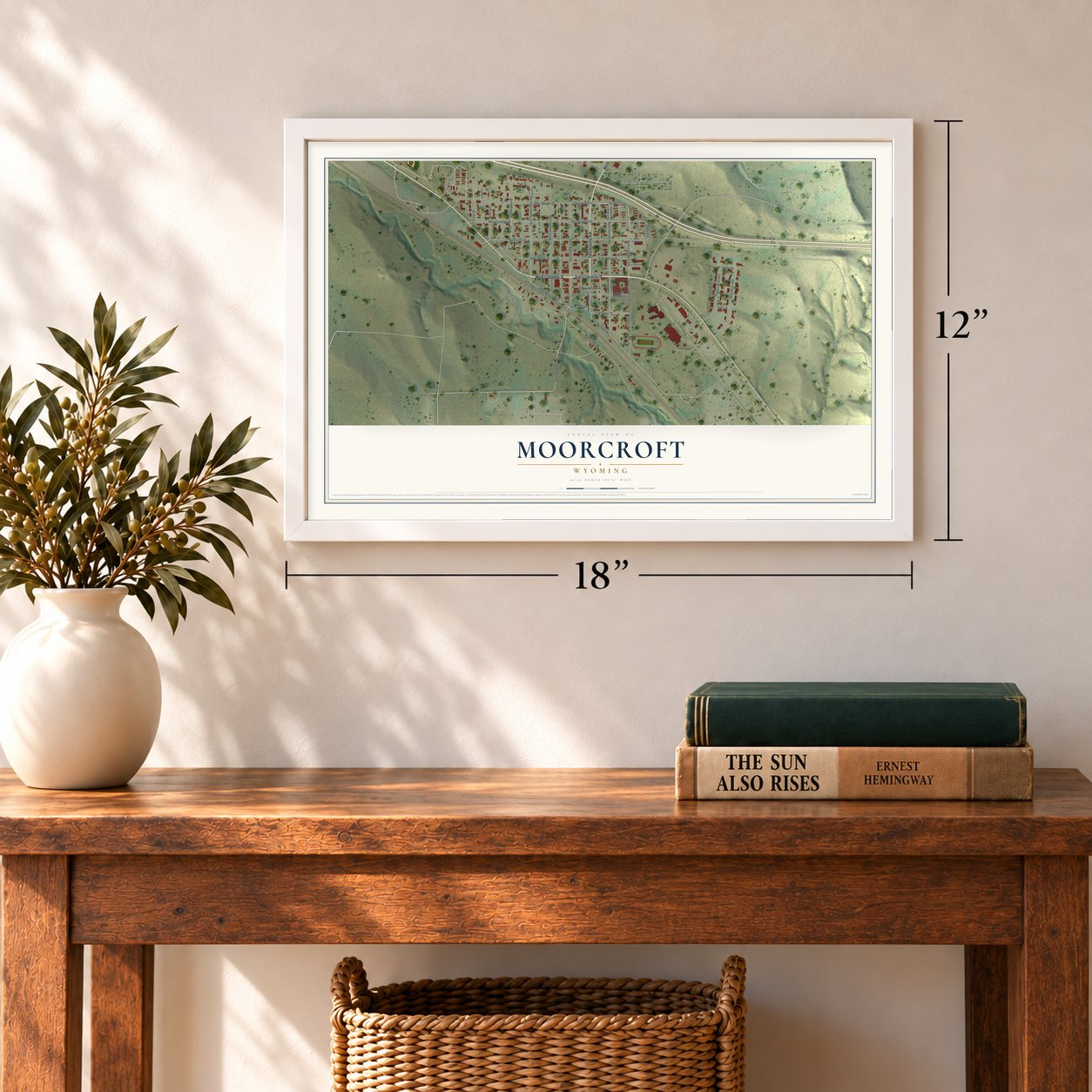 Moorcroft, Wyoming map, 12 x 18 inch print in a white frame in an entryway
