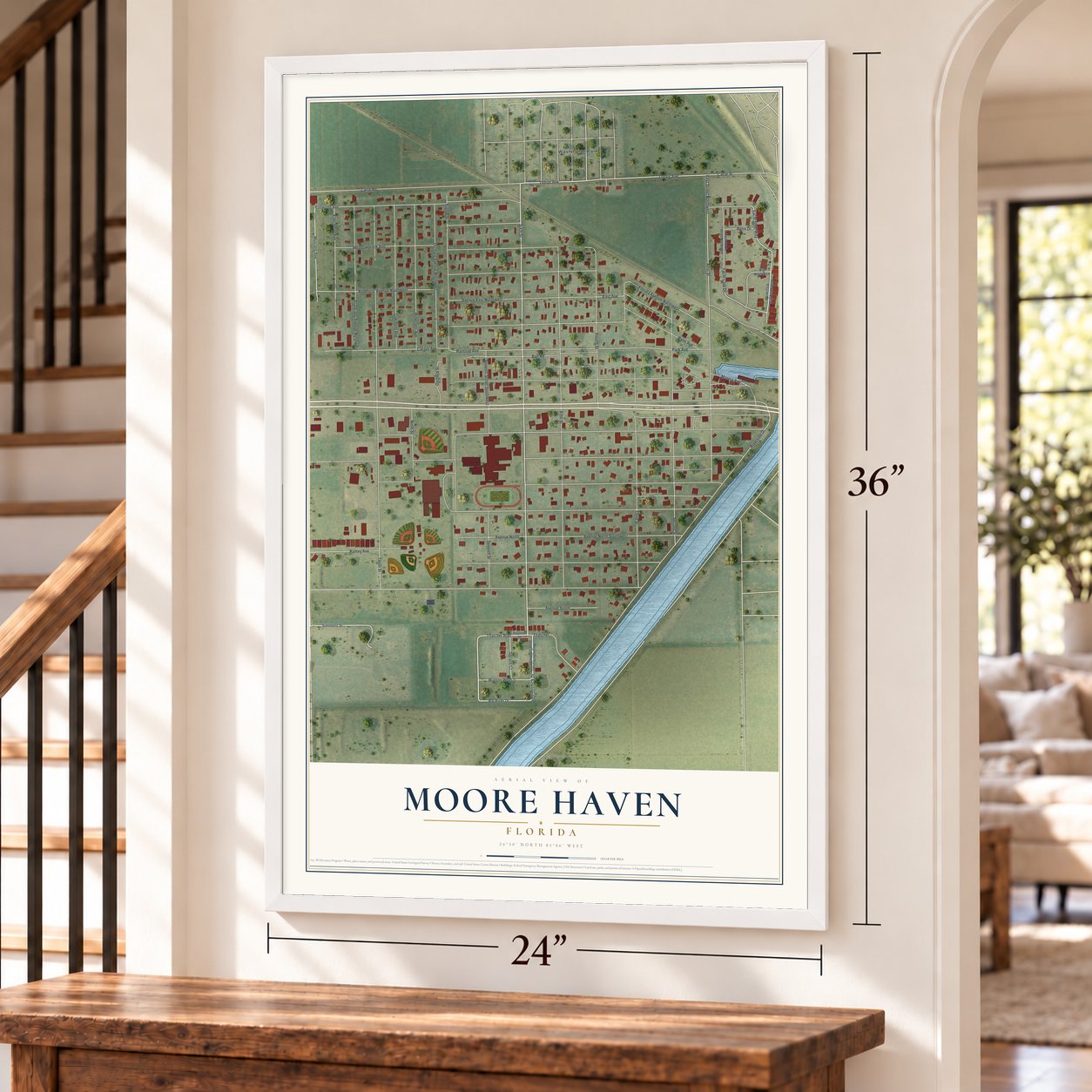 Moore Haven, Florida map, 24 x 36 inch print in a white frame by a staircase