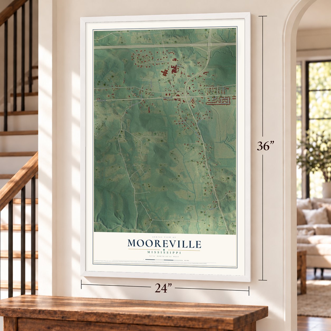 Mooreville, Mississippi map, 24 x 36 inch print in a white frame by a staircase