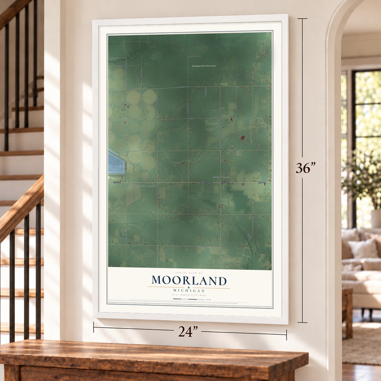 Moorland, Michigan map, 24 x 36 inch print in a white frame by a staircase