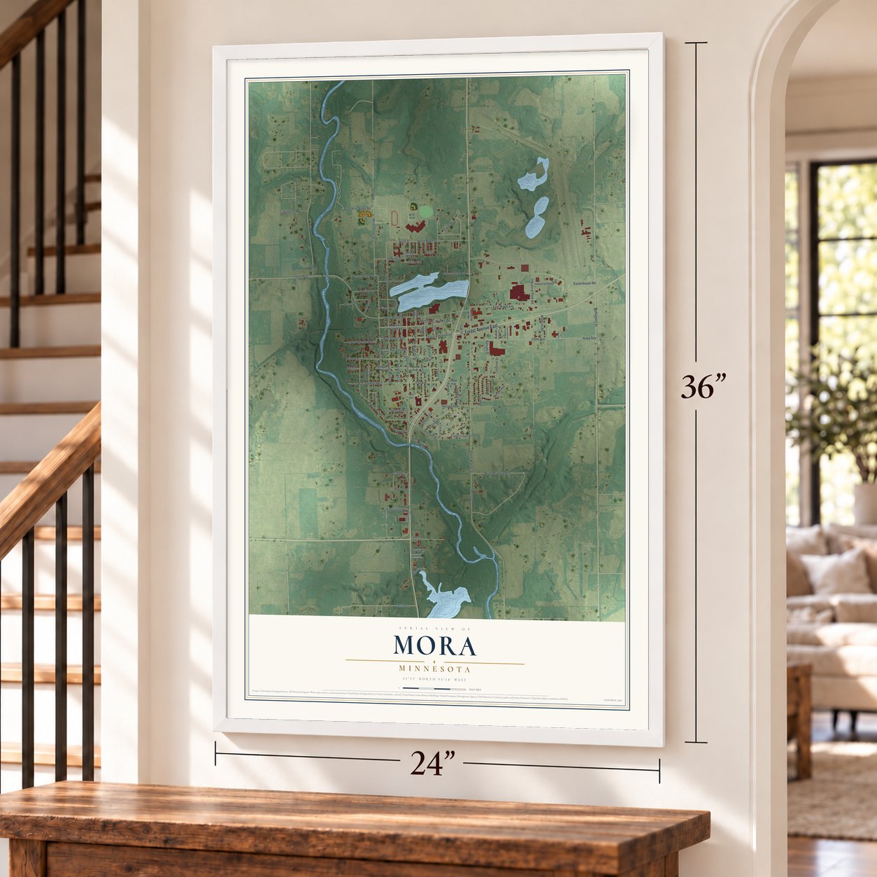 Mora, Minnesota map, 24 x 36 inch print in a white frame by a staircase