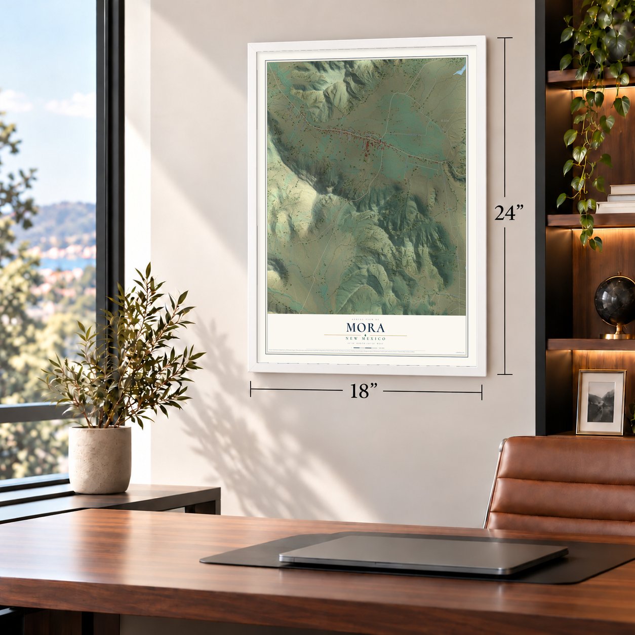 Mora, New Mexico map, 18 x 24 inch print in a white frame in a home office