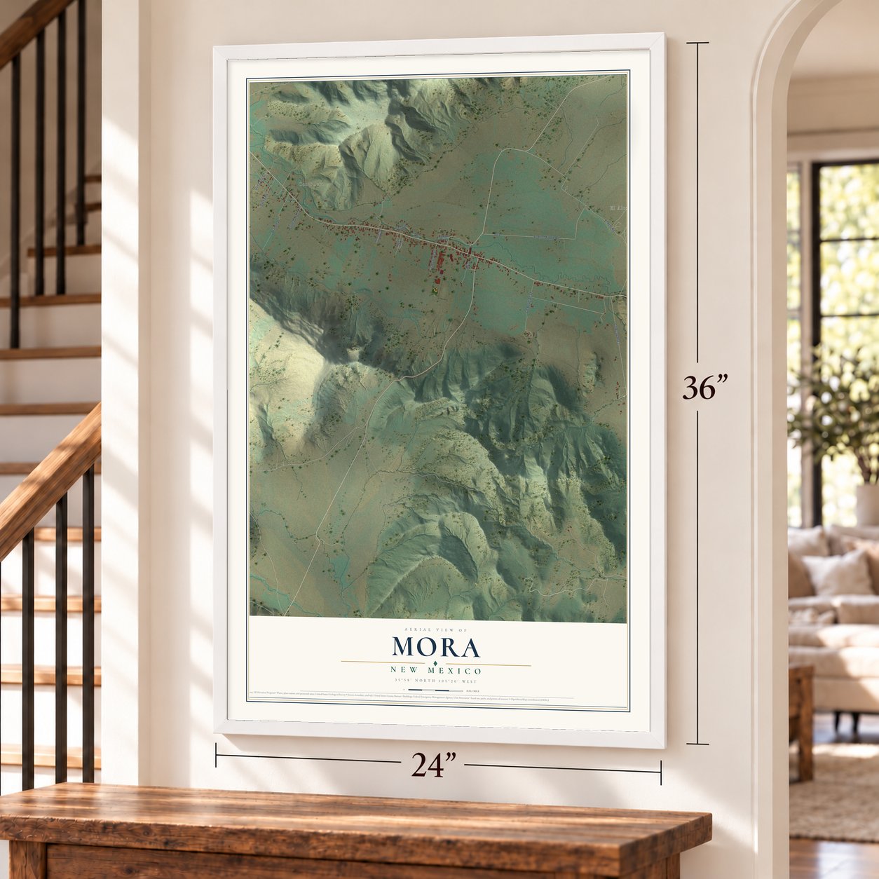 Mora, New Mexico map, 24 x 36 inch print in a white frame by a staircase