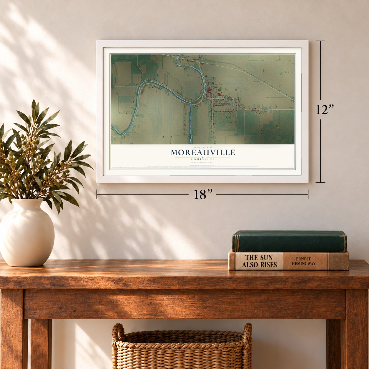 Moreauville, Louisiana map, 12 x 18 inch print in a white frame in an entryway