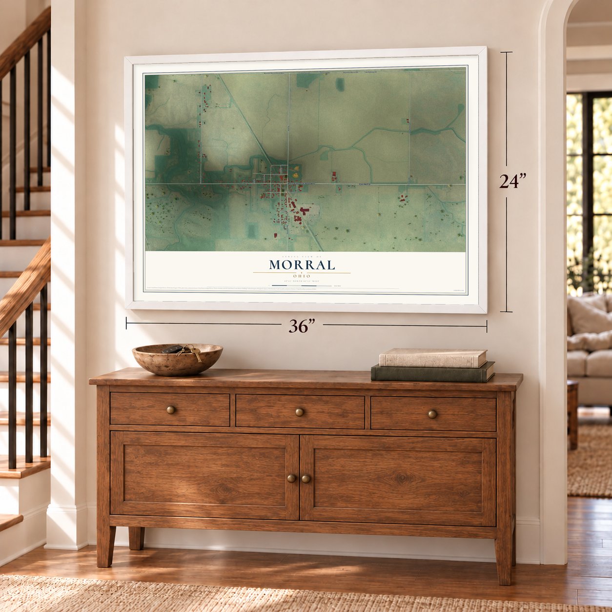 Morral, Ohio map, 24 x 36 inch print in a white frame above a dresser by a staircase