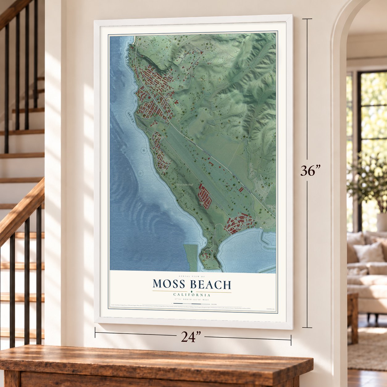 Moss Beach, California map, 24 x 36 inch print in a white frame by a staircase