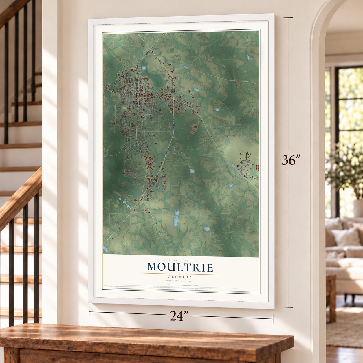 Moultrie, Georgia map, 24 x 36 inch print in a white frame by a staircase