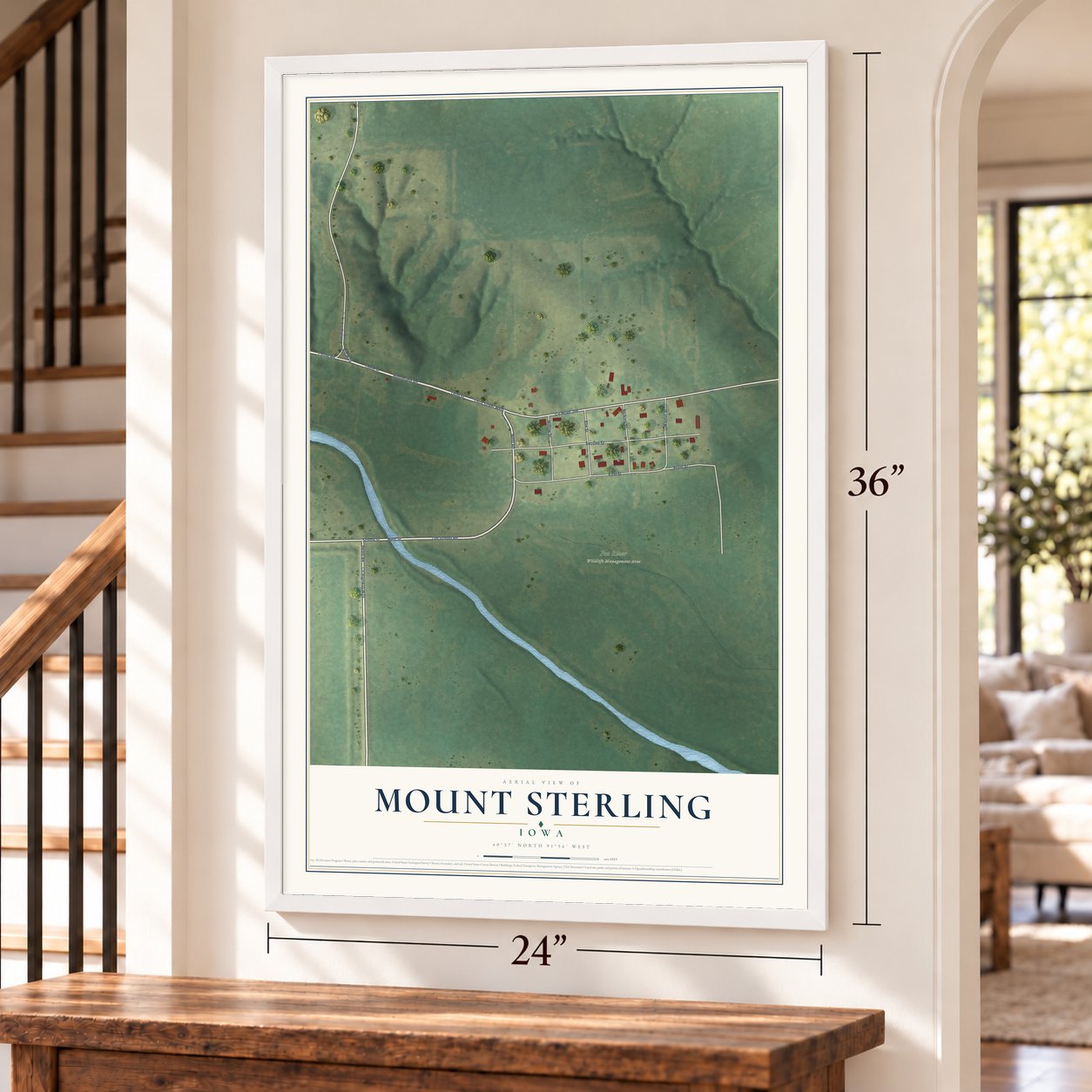 Mount Sterling, Iowa map, 24 x 36 inch print in a white frame by a staircase