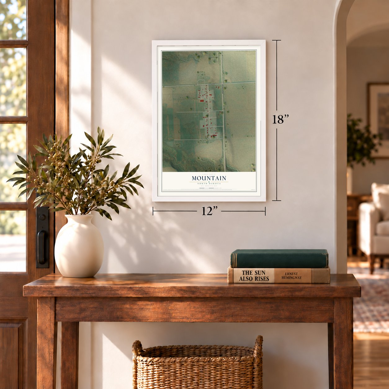 Mountain, North Dakota map, 12 x 18 inch print in a white frame in an entryway