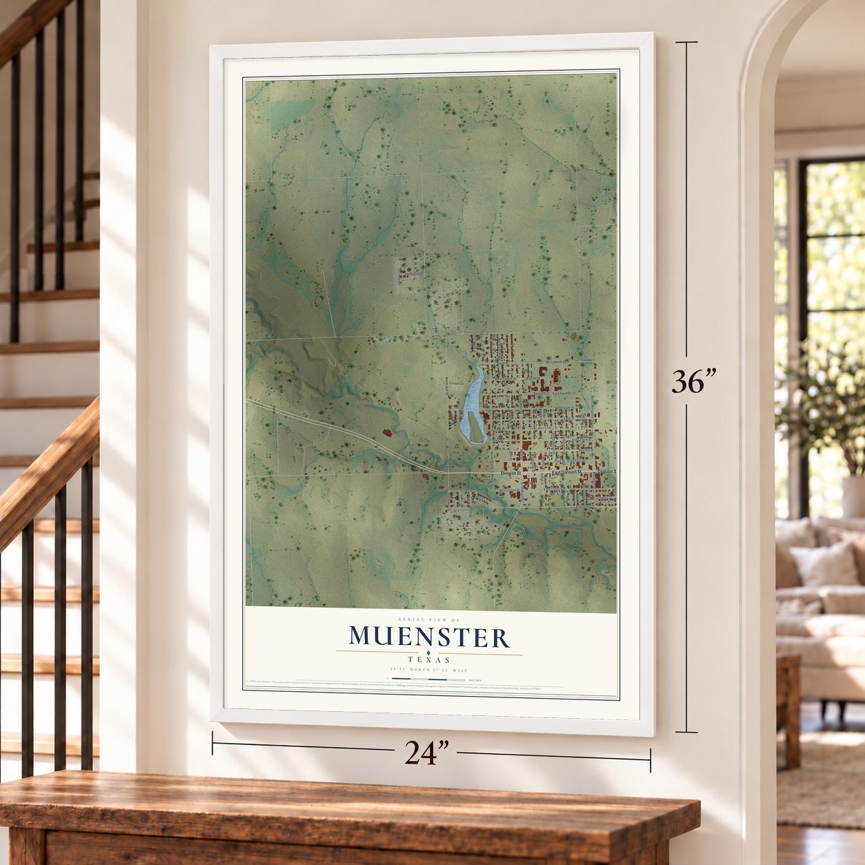 Muenster, Texas map, 24 x 36 inch print in a white frame by a staircase