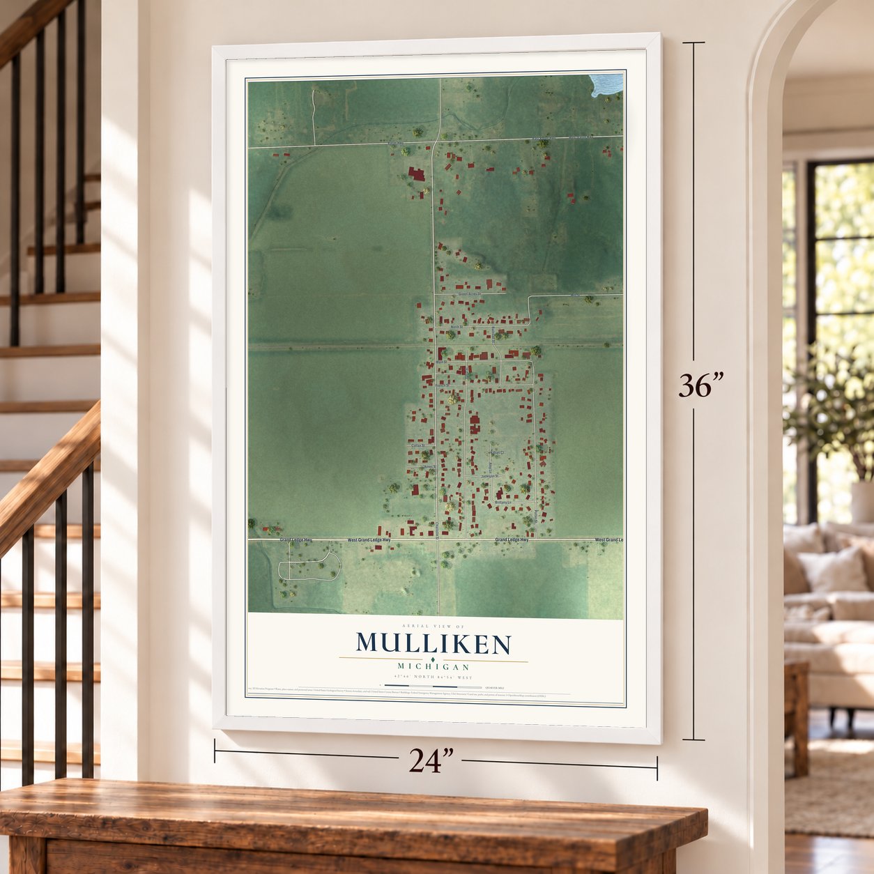 Mulliken, Michigan map, 24 x 36 inch print in a white frame by a staircase