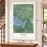 Munro, Michigan map, 24 x 36 inch print in a white frame by a staircase